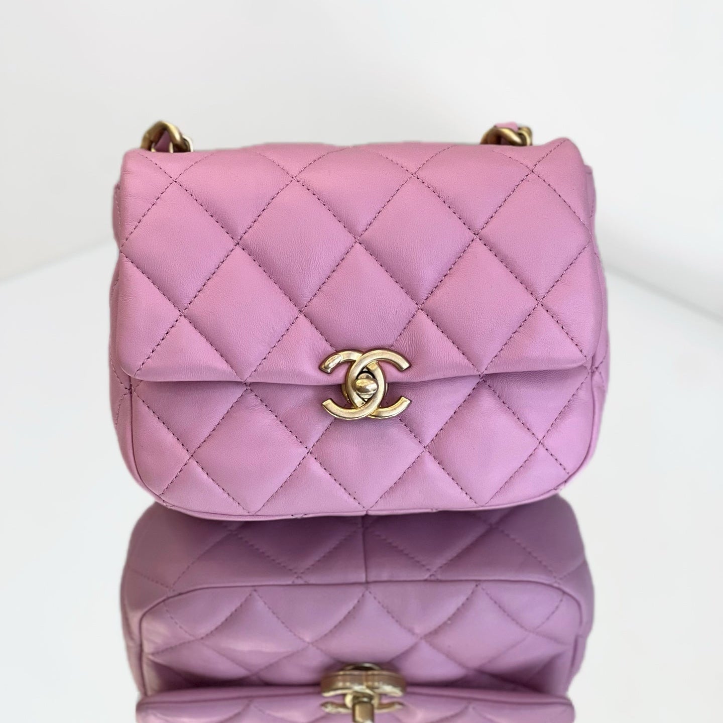 Chanel Pink Quilted Leather Mini Round Flap Bag with Braided Leather Chain & Gold-Tone Hardware